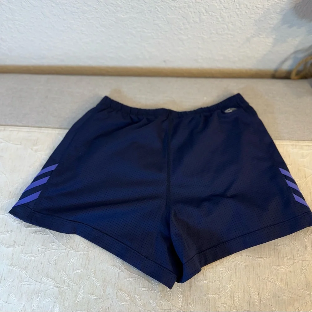 Adidas women's athletic climacool shorts size S. Navy blue with‎ purple stripes